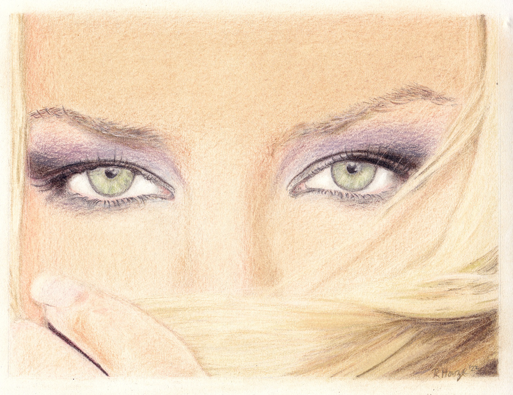 Green eyes with violet shading, framed by flowing hair.